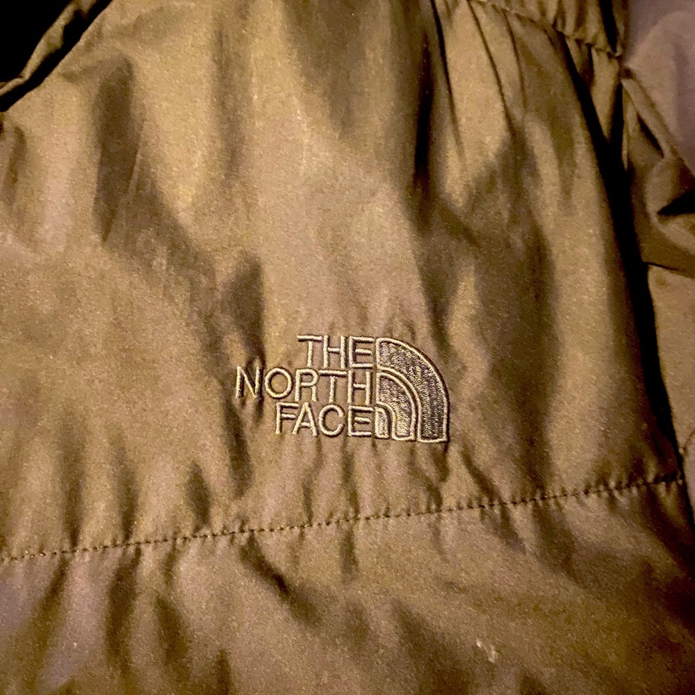 North face jacket black on black, very comfortable X-Large in size.